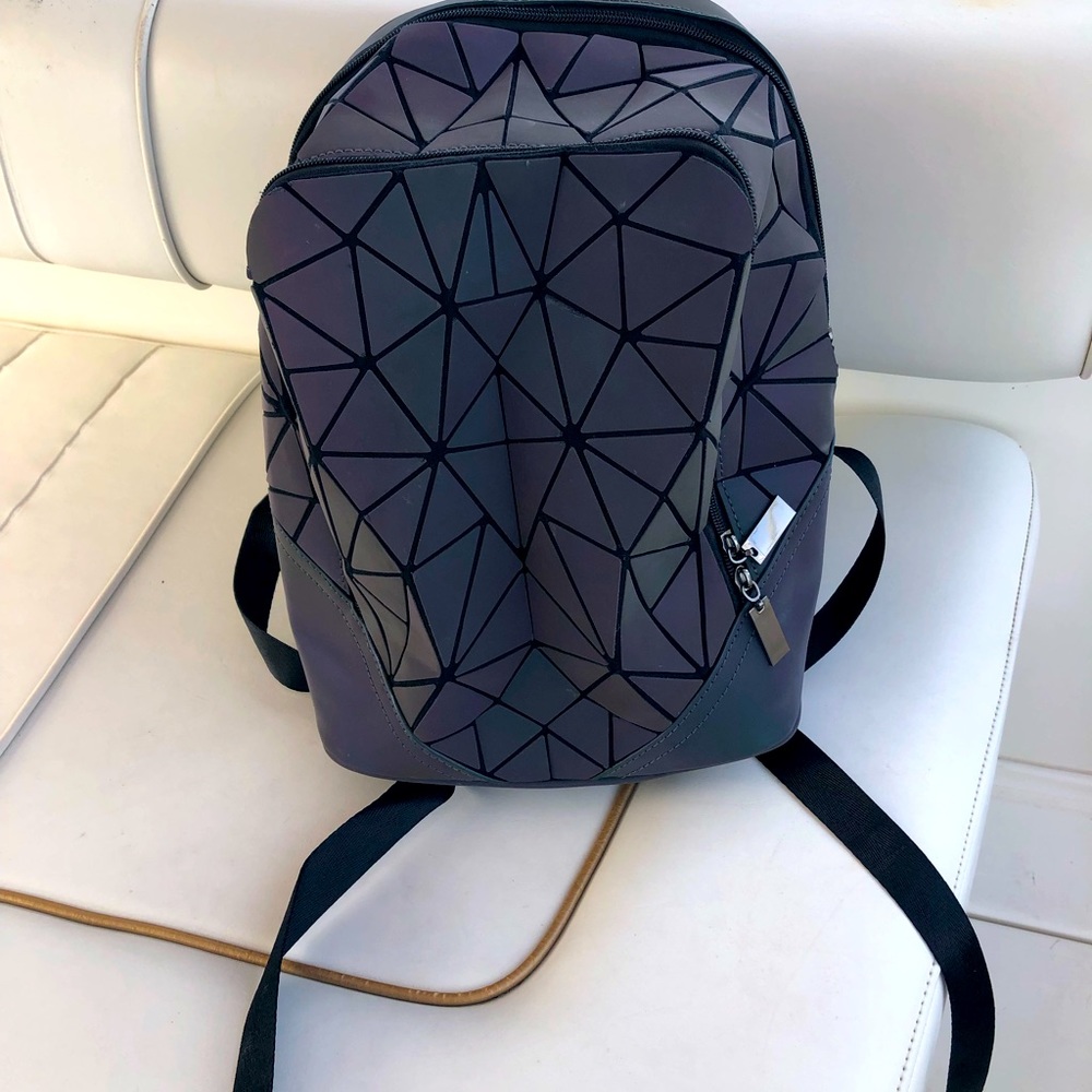 Small back pack purple ish in color